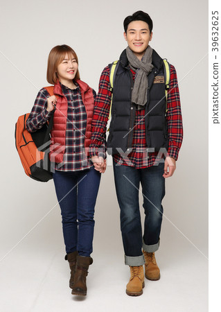 Happy young traveler couple concept photo. set out on a trip to honeymoon, camping and summer vacation concept isolated on white background. 368 Happy young traveler couple concept photo. set out on a trip to honeymoon, camping and summer vacation concept isolated on white background. 368 39632625