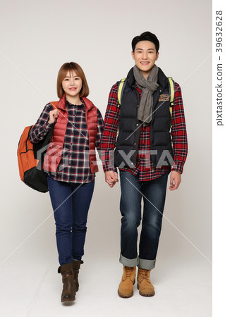 Happy young traveler couple concept photo. set out on a trip to honeymoon, camping and summer vacation concept isolated on white background. 367 Happy young traveler couple concept photo. set out on a trip to honeymoon, camping and summer vacation concept isolated on white background. 367 39632628