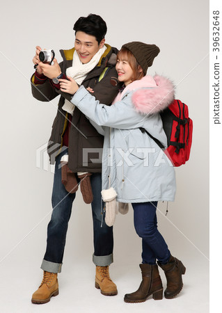 Happy young traveler couple concept photo. set out on a trip to honeymoon, camping and summer vacation concept isolated on white background. 302 Happy young traveler couple concept photo. set out on a trip to honeymoon, camping and summer vacation concept isolated on white background. 302 39632648
