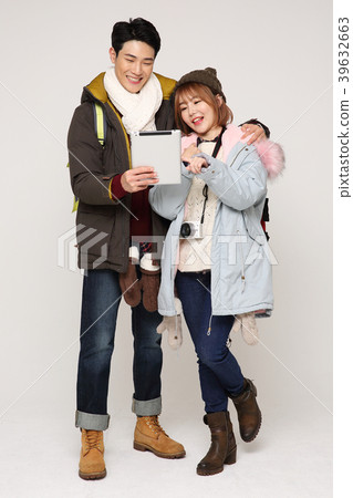 Happy young traveler couple concept photo. set out on a trip to honeymoon, camping and summer vacation concept isolated on white background. 289 Happy young traveler couple concept photo. set out on a trip to honeymoon, camping and summer vacation concept isolated on white background. 289 39632663