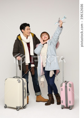Happy young traveler couple concept photo. set out on a trip to honeymoon, camping and summer vacation concept isolated on white background. 342 Happy young traveler couple concept photo. set out on a trip to honeymoon, camping and summer vacation concept isolated on white background. 342 39632686