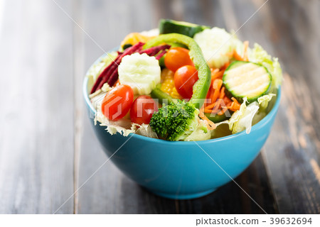 Vegetables salad in a bowl, healthy food Vegetables salad in a bowl, healthy food 39632694