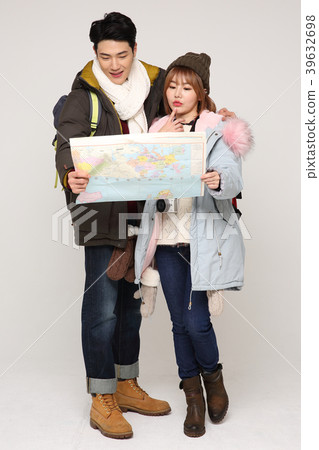 Happy young traveler couple concept photo. set out on a trip to honeymoon, camping and summer vacation concept isolated on white background. 282 Happy young traveler couple concept photo. set out on a trip to honeymoon, camping and summer vacation concept isolated on white background. 282 39632698
