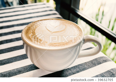 A cup of latte art in the coffee shop A cup of latte art in the coffee shop 39632705