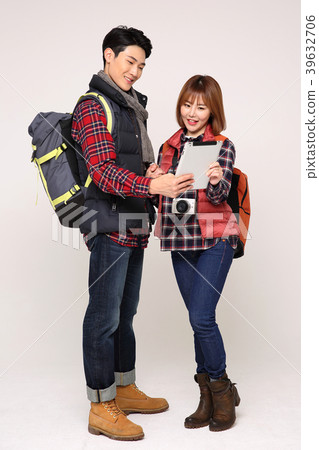 Happy young traveler couple concept photo. set out on a trip to honeymoon, camping and summer vacation concept isolated on white background. 401 Happy young traveler couple concept photo. set out on a trip to honeymoon, camping and summer vacation concept isolated on white background. 401 39632706