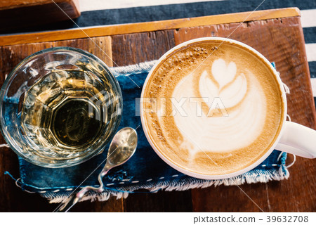 Cup of latte art and hot tea, top view Cup of latte art and hot tea, top view 39632708