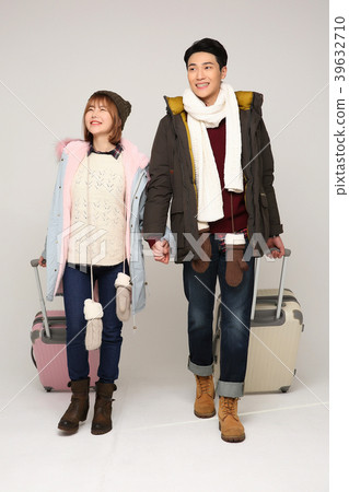 Happy young traveler couple concept photo. set out on a trip to honeymoon, camping and summer vacation concept isolated on white background. 330 Happy young traveler couple concept photo. set out on a trip to honeymoon, camping and summer vacation concept isolated on white background. 330 39632710