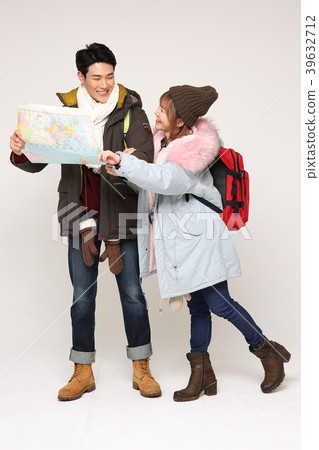 Happy young traveler couple concept photo. set out on a trip to honeymoon, camping and summer vacation concept isolated on white background. 279 Happy young traveler couple concept photo. set out on a trip to honeymoon, camping and summer vacation concept isolated on white background. 279 39632712