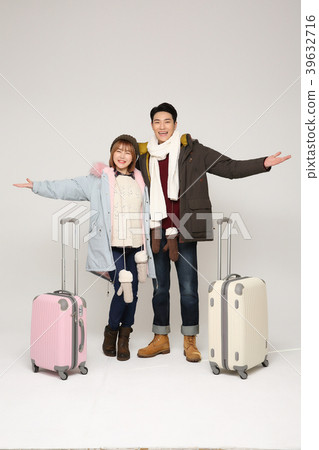Happy young traveler couple concept photo. set out on a trip to honeymoon, camping and summer vacation concept isolated on white background. 326 Happy young traveler couple concept photo. set out on a trip to honeymoon, camping and summer vacation concept isolated on white background. 326 39632716
