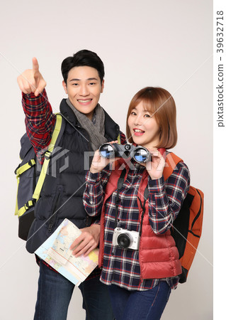 Happy young traveler couple concept photo. set out on a trip to honeymoon, camping and summer vacation concept isolated on white background. 397 Happy young traveler couple concept photo. set out on a trip to honeymoon, camping and summer vacation concept isolated on white background. 397 39632718