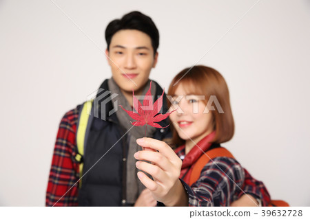 Happy young traveler couple concept photo. set out on a trip to honeymoon, camping and summer vacation concept isolated on white background. 388 Happy young traveler couple concept photo. set out on a trip to honeymoon, camping and summer vacation concept isolated on white background. 388 39632728