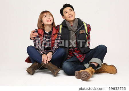 Happy young traveler couple concept photo. set out on a trip to honeymoon, camping and summer vacation concept isolated on white background. 377 Happy young traveler couple concept photo. set out on a trip to honeymoon, camping and summer vacation concept isolated on white background. 377 39632733