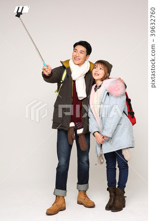 Happy young traveler couple concept photo. set out on a trip to honeymoon, camping and summer vacation concept isolated on white background. 273 Happy young traveler couple concept photo. set out on a trip to honeymoon, camping and summer vacation concept isolated on white background. 273 39632760