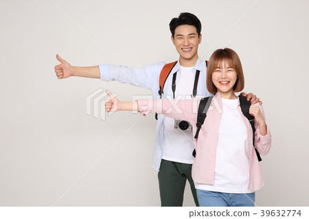 Happy young traveler couple concept photo. set out on a trip to honeymoon, camping and summer vacation concept isolated on white background. 197 Happy young traveler couple concept photo. set out on a trip to honeymoon, camping and summer vacation concept isolated on white background. 197 39632774