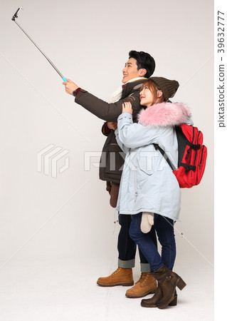 Happy young traveler couple concept photo. set out on a trip to honeymoon, camping and summer vacation concept isolated on white background. 270 Happy young traveler couple concept photo. set out on a trip to honeymoon, camping and summer vacation concept isolated on white background. 270 39632777
