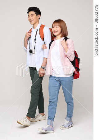 Happy young traveler couple concept photo. set out on a trip to honeymoon, camping and summer vacation concept isolated on white background. 155 Happy young traveler couple concept photo. set out on a trip to honeymoon, camping and summer vacation concept isolated on white background. 155 39632778