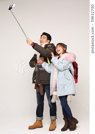Happy young traveler couple concept photo. set out on a trip to honeymoon, camping and summer vacation concept isolated on white background. 271 Happy young traveler couple concept photo. set out on a trip to honeymoon, camping and summer vacation concept isolated on white background. 271 39632780