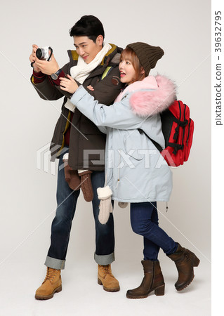 Happy young traveler couple concept photo. set out on a trip to honeymoon, camping and summer vacation concept isolated on white background. 303 Happy young traveler couple concept photo. set out on a trip to honeymoon, camping and summer vacation concept isolated on white background. 303 39632795