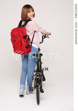 Young traveler woman with a backpack concept isolated on White photo. 144 Young traveler woman with a backpack concept isolated on White photo. 144 39632803