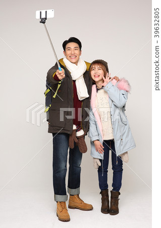 Happy young traveler couple concept photo. set out on a trip to honeymoon, camping and summer vacation concept isolated on white background. 274 Happy young traveler couple concept photo. set out on a trip to honeymoon, camping and summer vacation concept isolated on white background. 274 39632805