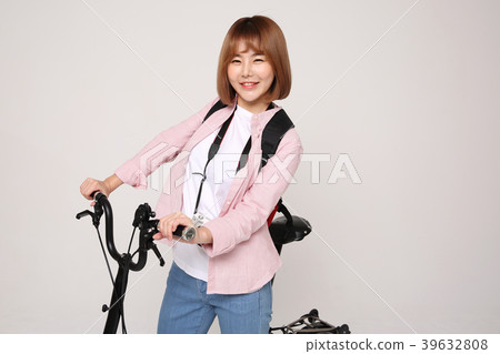 Young traveler woman with a backpack concept isolated on White photo. 142 Young traveler woman with a backpack concept isolated on White photo. 142 39632808