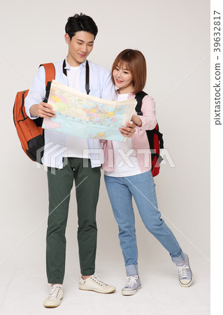 Happy young traveler couple concept photo. set out on a trip to honeymoon, camping and summer vacation concept isolated on white background. 216 Happy young traveler couple concept photo. set out on a trip to honeymoon, camping and summer vacation concept isolated on white background. 216 39632817