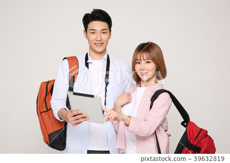 Happy young traveler couple concept photo. set out on a trip to honeymoon, camping and summer vacation concept isolated on white background. 212 Happy young traveler couple concept photo. set out on a trip to honeymoon, camping and summer vacation concept isolated on white background. 212 39632819