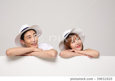 Happy young traveler couple concept photo. set out on a trip to honeymoon, camping and summer vacation concept isolated on white background. 489 Happy young traveler couple concept photo. set out on a trip to honeymoon, camping and summer vacation concept isolated on white background. 489 39632820