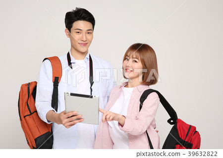 Happy young traveler couple concept photo. set out on a trip to honeymoon, camping and summer vacation concept isolated on white background. 211 Happy young traveler couple concept photo. set out on a trip to honeymoon, camping and summer vacation concept isolated on white background. 211 39632822