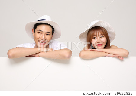 Happy young traveler couple concept photo. set out on a trip to honeymoon, camping and summer vacation concept isolated on white background. 488 Happy young traveler couple concept photo. set out on a trip to honeymoon, camping and summer vacation concept isolated on white background. 488 39632823