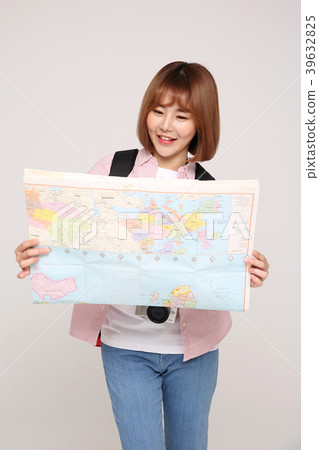 Young traveler woman with a backpack concept isolated on White photo. 120 Young traveler woman with a backpack concept isolated on White photo. 120 39632825