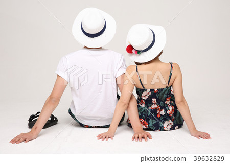 Happy young traveler couple concept photo. set out on a trip to honeymoon, camping and summer vacation concept isolated on white background. 481 Happy young traveler couple concept photo. set out on a trip to honeymoon, camping and summer vacation concept isolated on white background. 481 39632829