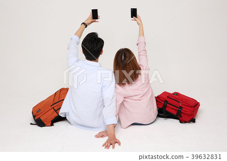 Happy young traveler couple concept photo. set out on a trip to honeymoon, camping and summer vacation concept isolated on white background. 206 Happy young traveler couple concept photo. set out on a trip to honeymoon, camping and summer vacation concept isolated on white background. 206 39632831