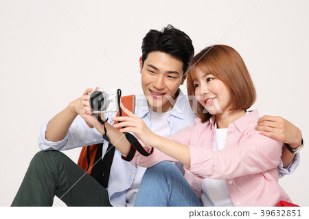 Happy young traveler couple concept photo. set out on a trip to honeymoon, camping and summer vacation concept isolated on white background. 203 Happy young traveler couple concept photo. set out on a trip to honeymoon, camping and summer vacation concept isolated on white background. 203 39632851