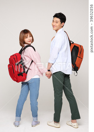 Happy young traveler couple concept photo. set out on a trip to honeymoon, camping and summer vacation concept isolated on white background. 162 Happy young traveler couple concept photo. set out on a trip to honeymoon, camping and summer vacation concept isolated on white background. 162 39632856