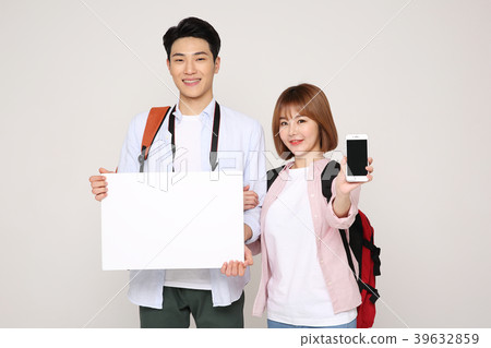 Happy young traveler couple concept photo. set out on a trip to honeymoon, camping and summer vacation concept isolated on white background. 223 Happy young traveler couple concept photo. set out on a trip to honeymoon, camping and summer vacation concept isolated on white background. 223 39632859