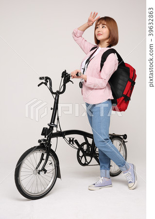 Young traveler woman with a backpack concept isolated on White photo. 139 Young traveler woman with a backpack concept isolated on White photo. 139 39632863