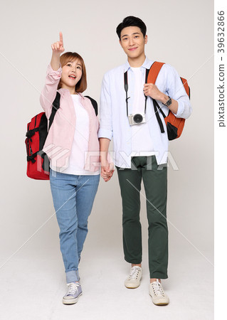 Happy young traveler couple concept photo. set out on a trip to honeymoon, camping and summer vacation concept isolated on white background. 151 Happy young traveler couple concept photo. set out on a trip to honeymoon, camping and summer vacation concept isolated on white background. 151 39632866