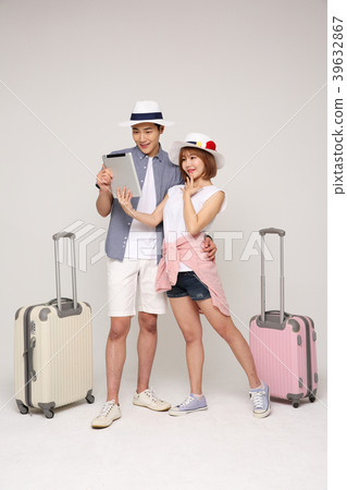 Happy young traveler couple concept photo. set out on a trip to honeymoon, camping and summer vacation concept isolated on white background. 427 Happy young traveler couple concept photo. set out on a trip to honeymoon, camping and summer vacation concept isolated on white background. 427 39632867