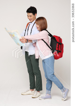 Happy young traveler couple concept photo. set out on a trip to honeymoon, camping and summer vacation concept isolated on white background. 215 Happy young traveler couple concept photo. set out on a trip to honeymoon, camping and summer vacation concept isolated on white background. 215 39632868