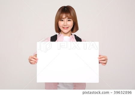 Young traveler woman with a backpack concept isolated on White photo. 132 Young traveler woman with a backpack concept isolated on White photo. 132 39632896