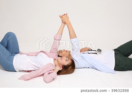 Happy young traveler couple concept photo. set out on a trip to honeymoon, camping and summer vacation concept isolated on white background. 173 Happy young traveler couple concept photo. set out on a trip to honeymoon, camping and summer vacation concept isolated on white background. 173 39632898
