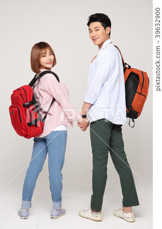 Happy young traveler couple concept photo. set out on a trip to honeymoon, camping and summer vacation concept isolated on white background. 161 Happy young traveler couple concept photo. set out on a trip to honeymoon, camping and summer vacation concept isolated on white background. 161 39632900