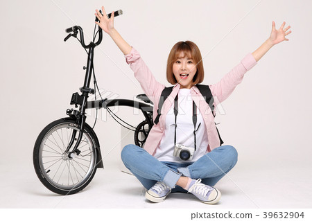 Young traveler woman with a backpack concept isolated on White photo. 147 Young traveler woman with a backpack concept isolated on White photo. 147 39632904