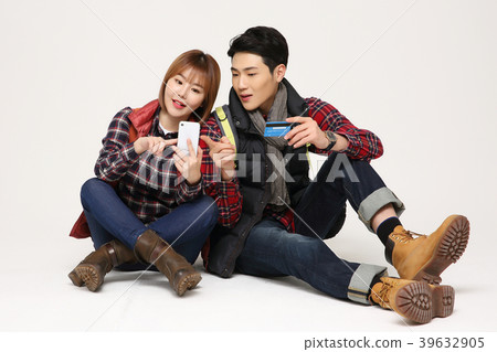 Happy young traveler couple concept photo. set out on a trip to honeymoon, camping and summer vacation concept isolated on white background. 379 Happy young traveler couple concept photo. set out on a trip to honeymoon, camping and summer vacation concept isolated on white background. 379 39632905