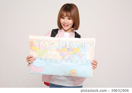 Young traveler woman with a backpack concept isolated on White photo. 121 Young traveler woman with a backpack concept isolated on White photo. 121 39632906