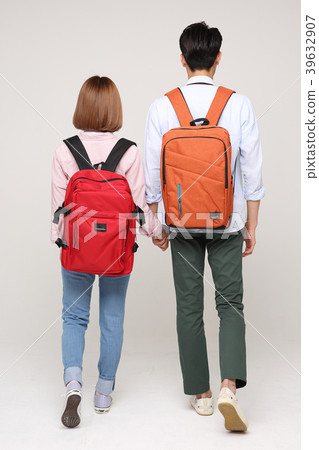 Happy young traveler couple concept photo. set out on a trip to honeymoon, camping and summer vacation concept isolated on white background. 157 Happy young traveler couple concept photo. set out on a trip to honeymoon, camping and summer vacation concept isolated on white background. 157 39632907