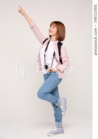 Young traveler woman with a backpack concept isolated on White photo. 043 Young traveler woman with a backpack concept isolated on White photo. 043 39632908