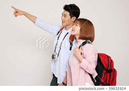 Happy young traveler couple concept photo. set out on a trip to honeymoon, camping and summer vacation concept isolated on white background. 192 Happy young traveler couple concept photo. set out on a trip to honeymoon, camping and summer vacation concept isolated on white background. 192 39632924