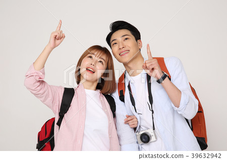 Happy young traveler couple concept photo. set out on a trip to honeymoon, camping and summer vacation concept isolated on white background. 187 Happy young traveler couple concept photo. set out on a trip to honeymoon, camping and summer vacation concept isolated on white background. 187 39632942